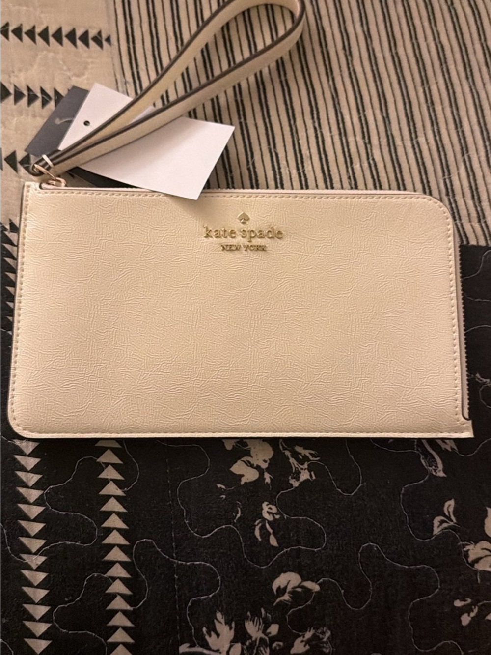 kate spade Cream Zip Wristlet with Gold Logo